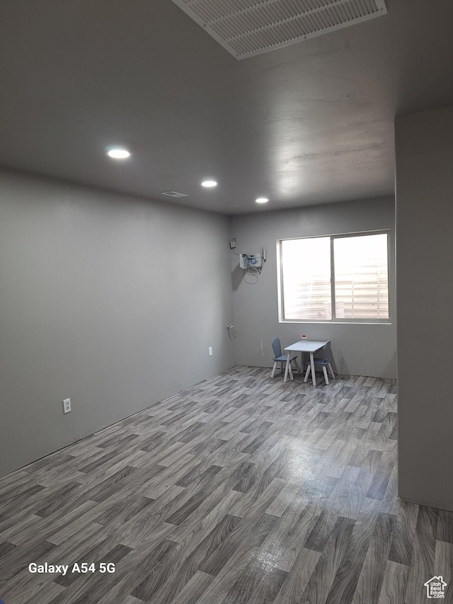 546 S Quirk St, Grantsville, UT 84029 - empty room featuring visible vents, wood finished floors, and recessed lighting