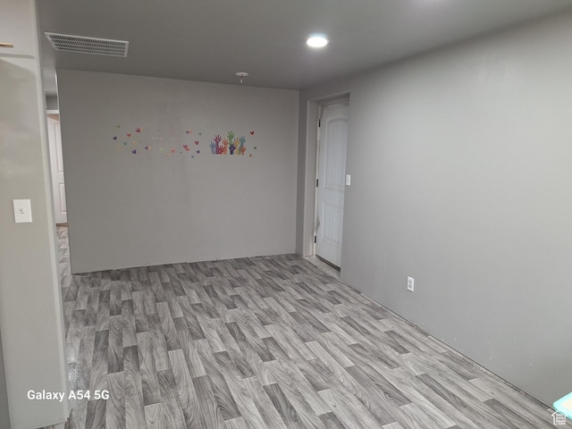 546 S Quirk St, Grantsville, UT 84029 - spare room featuring light wood-type flooring and visible vents