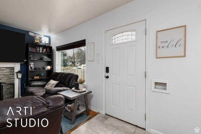 2209 Van Buren Ave, Ogden, UT 84401 - entryway featuring light tile patterned floors and baseboards