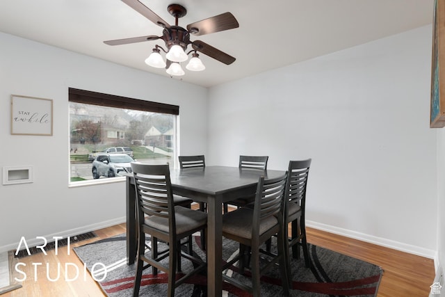 2209 Van Buren Ave, Ogden, UT 84401 - dining area featuring baseboards, wood finished floors, and ceiling fan