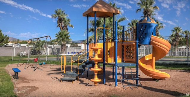 community play area featuring fence