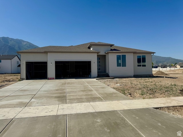 1018 E 250 S Unit 16, Salem, UT 84653 - prairie-style home featuring a mountain view, an attached garage, and concrete driveway