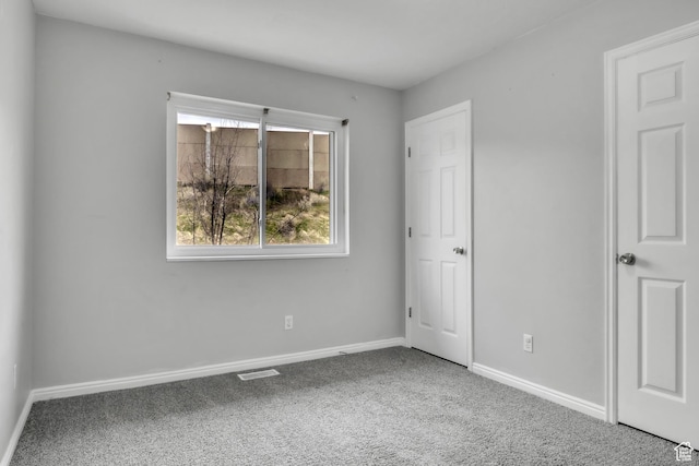 565 N Lynnbrook Dr, Spanish Fork, UT 84660 - unfurnished bedroom featuring baseboards, carpet flooring, and visible vents