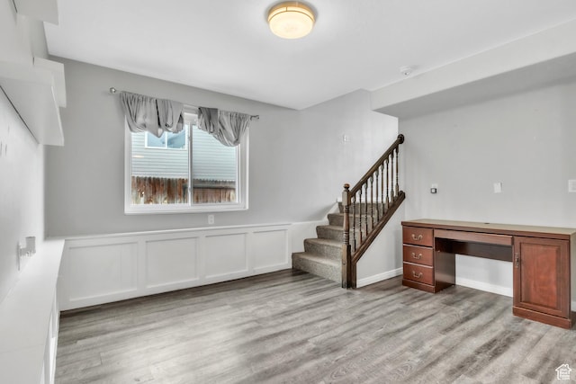 565 N Lynnbrook Dr, Spanish Fork, UT 84660 - interior space with a decorative wall, wood finished floors, stairway, and wainscoting