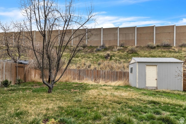 565 N Lynnbrook Dr, Spanish Fork, UT 84660 - view of yard featuring a fenced backyard, a shed, and an outbuilding