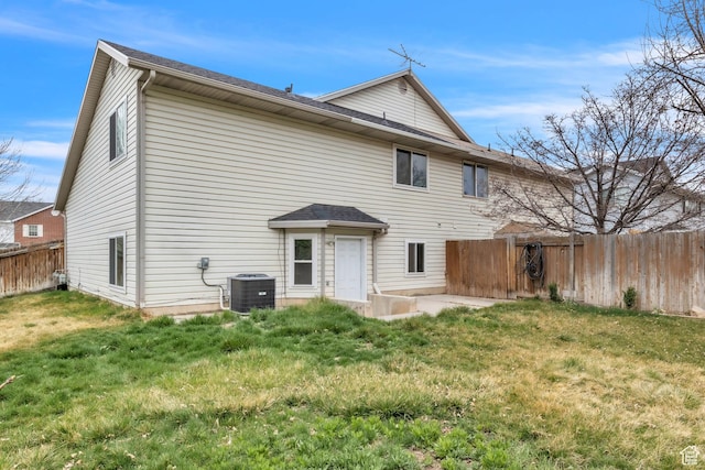 565 N Lynnbrook Dr, Spanish Fork, UT 84660 - rear view of property with central AC unit, fence, a patio, and a yard