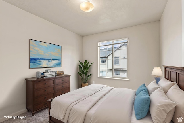 1762 N 460 W Unit 103-10, Logan, UT 84341 - bedroom with light colored carpet and baseboards