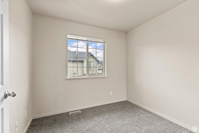 1762 N 460 W Unit 103-10, Logan, UT 84341 - spare room with visible vents, baseboards, and carpet