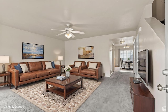 1762 N 460 W Unit 103-10, Logan, UT 84341 - living area featuring baseboards, a ceiling fan, and light carpet
