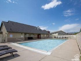 1762 N 460 W Unit 103-10, Logan, UT 84341 - pool with fence and a patio