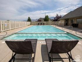 1762 N 460 W Unit 103-10, Logan, UT 84341 - community pool featuring a patio and fence