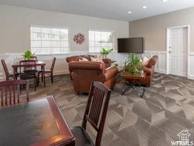 1762 N 460 W Unit 103-10, Logan, UT 84341 - living room featuring wainscoting and recessed lighting