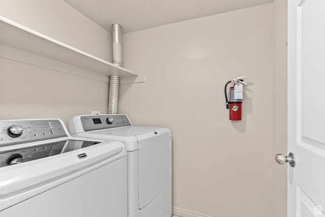 1762 N 460 W Unit 103-10, Logan, UT 84341 - washroom with separate washer and dryer and laundry area