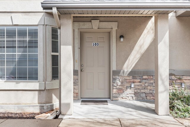 1762 N 460 W Unit 103-10, Logan, UT 84341 - view of exterior entry featuring stone siding