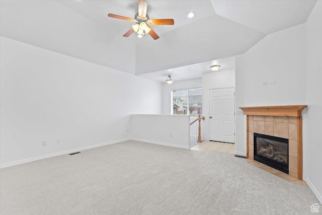 9587 N 4500 W, Cedar Hills, UT 84062 - unfurnished living room with vaulted ceiling, baseboards, ceiling fan, light carpet, and a fireplace