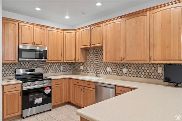 9587 N 4500 W, Cedar Hills, UT 84062 - kitchen with light tile patterned floors, light countertops, a sink, and stainless steel appliances