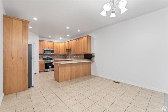 9587 N 4500 W, Cedar Hills, UT 84062 - kitchen with light countertops, a peninsula, stainless steel appliances, visible vents, and decorative backsplash