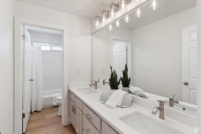 166 E 2300 S, Kaysville, UT 84037 - full bathroom with double vanity, toilet, a sink, and wood finished floors