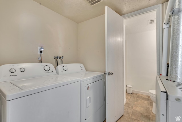 2683 S Melville Dr, Magna, UT 84044 - clothes washing area with laundry area, separate washer and dryer, and visible vents