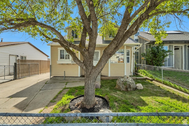 2683 S Melville Dr, Magna, UT 84044 - exterior space featuring a yard, roof with shingles, and fence