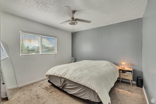 2683 S Melville Dr, Magna, UT 84044 - carpeted bedroom featuring a textured ceiling, baseboards, and ceiling fan