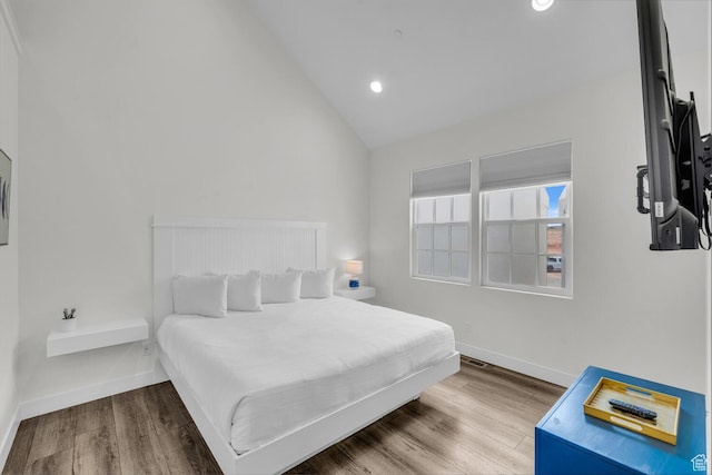 4301 W Canterbury Rd, Hurricane, UT 84737 - bedroom with baseboards, lofted ceiling, wood finished floors, and recessed lighting