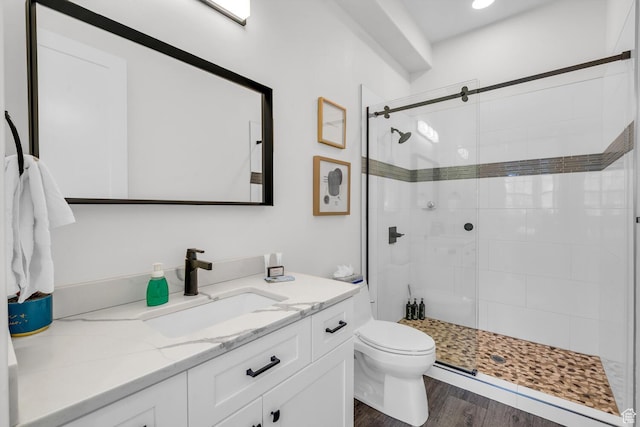 4301 W Canterbury Rd, Hurricane, UT 84737 - full bath featuring a shower stall, wood finished floors, toilet, and vanity