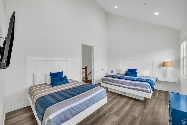 4301 W Canterbury Rd, Hurricane, UT 84737 - bedroom with baseboards, high vaulted ceiling, wood finished floors, and recessed lighting