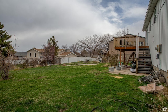 6100 W 3725 S, West Valley City, UT 84128 - view of yard featuring a fenced backyard, a wooden deck, and stairway