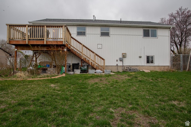 6100 W 3725 S, West Valley City, UT 84128 - back of house featuring fence, stairway, a yard, and a wooden deck