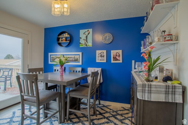 6100 W 3725 S, West Valley City, UT 84128 - dining room with baseboards and a textured ceiling