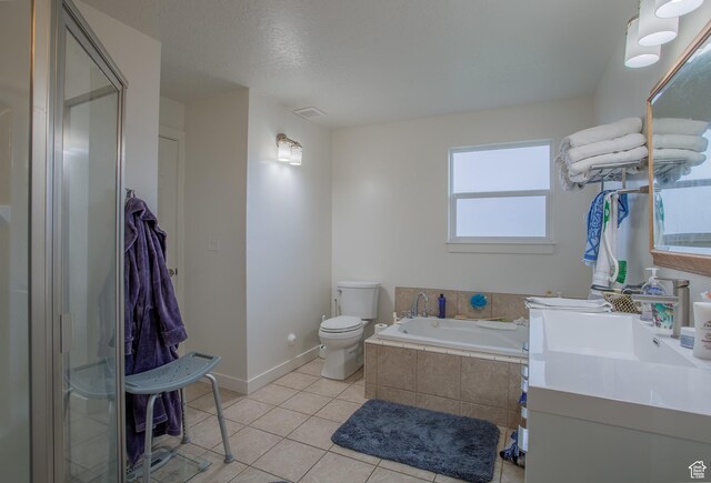 6100 W 3725 S, West Valley City, UT 84128 - full bath with tile patterned floors, toilet, a garden tub, a shower stall, and baseboards