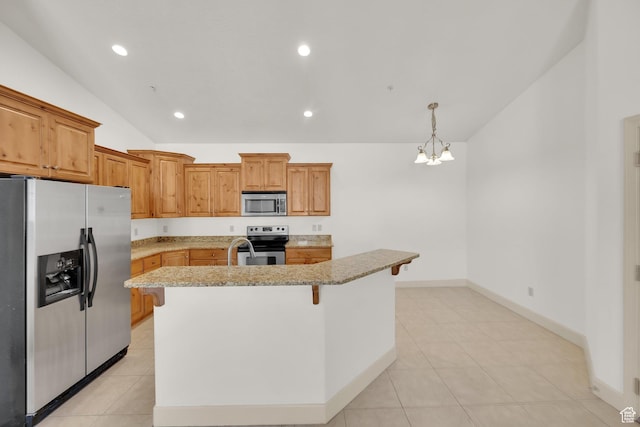 982 W 960 N Unit 116, Orem, UT 84057 - kitchen with an inviting chandelier, vaulted ceiling, light stone counters, a center island with sink, and stainless steel appliances