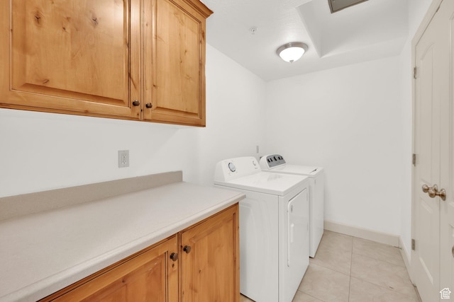 982 W 960 N Unit 116, Orem, UT 84057 - laundry room with washing machine and dryer, baseboards, cabinet space, and light tile patterned floors