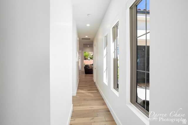 3169 S Pecos Dr, Washington, UT 84780 - hall with baseboards, light wood-type flooring, visible vents, and recessed lighting