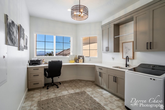 3169 S Pecos Dr, Washington, UT 84780 - office space featuring baseboards, washer / clothes dryer, and a sink