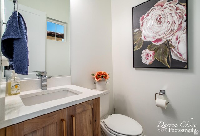 3169 S Pecos Dr, Washington, UT 84780 - bathroom featuring toilet and vanity