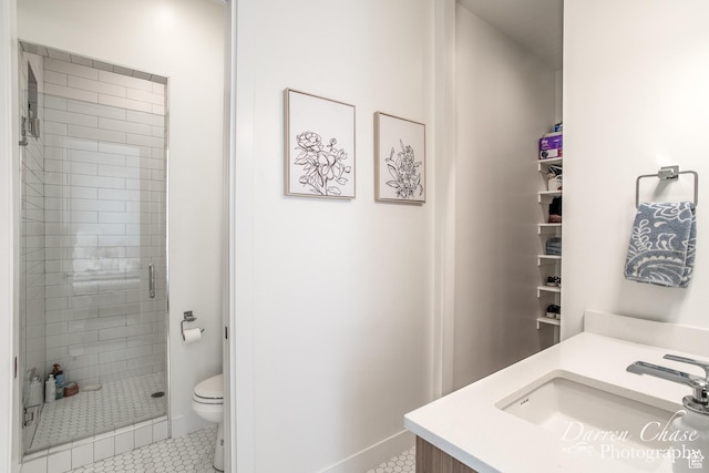 3169 S Pecos Dr, Washington, UT 84780 - bathroom with toilet, vanity, tile patterned floors, and a shower stall