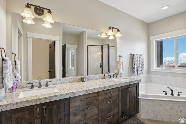 1713 E Viewside Cir, Hideout, UT 84036 - bathroom featuring a shower stall, double vanity, a sink, and a garden tub