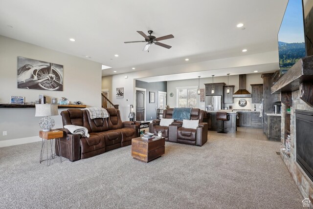 1713 E Viewside Cir, Hideout, UT 84036 - living room featuring ceiling fan, recessed lighting, stairway, light carpet, and a stone fireplace