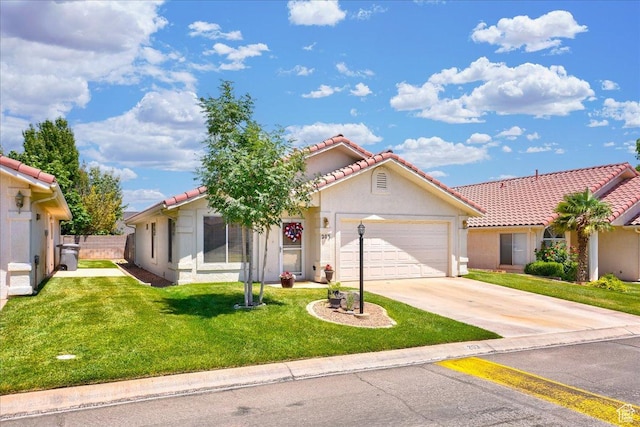 2050 W Canyon View Dr Unit 203, St George, UT 84770 - view of front of property with a tile roof, stucco siding, driveway, a front lawn, and a garage