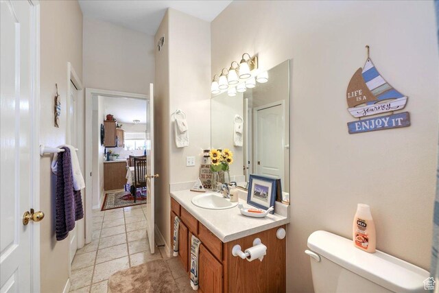 2050 W Canyon View Dr Unit 203, St George, UT 84770 - bathroom with toilet, tile patterned flooring, and vanity