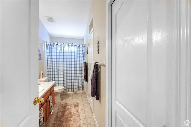 2050 W Canyon View Dr Unit 203, St George, UT 84770 - bathroom featuring tile patterned flooring, vanity, toilet, visible vents, and curtained shower