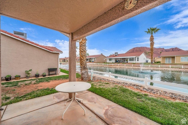 547 E Oasis Dr, Ivins, UT 84738 - view of patio / terrace with a residential view and a water view
