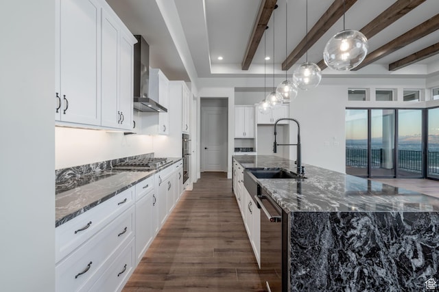 850 S Finley Cir Unit 239, North Salt Lake, UT 84054 - kitchen with wall chimney exhaust hood, appliances with stainless steel finishes, dark wood finished floors, a sink, and beamed ceiling