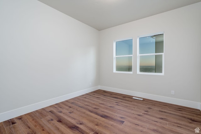 850 S Finley Cir Unit 239, North Salt Lake, UT 84054 - spare room with wood finished floors and baseboards