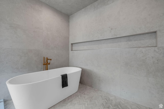 full bath with a soaking tub