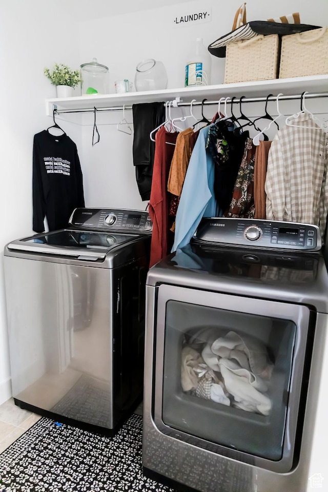 16436 S Bull Spring Ln, Bluffdale, UT 84065 - clothes washing area with tile patterned flooring, washer and clothes dryer, and laundry area