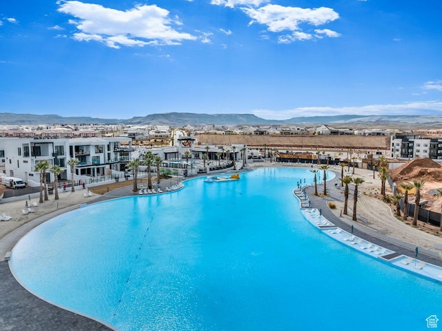 community pool featuring a mountain view