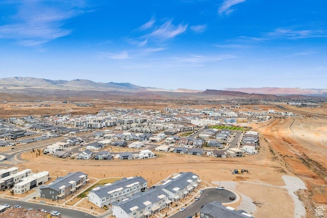 bird's eye view with a residential view and a mountain view